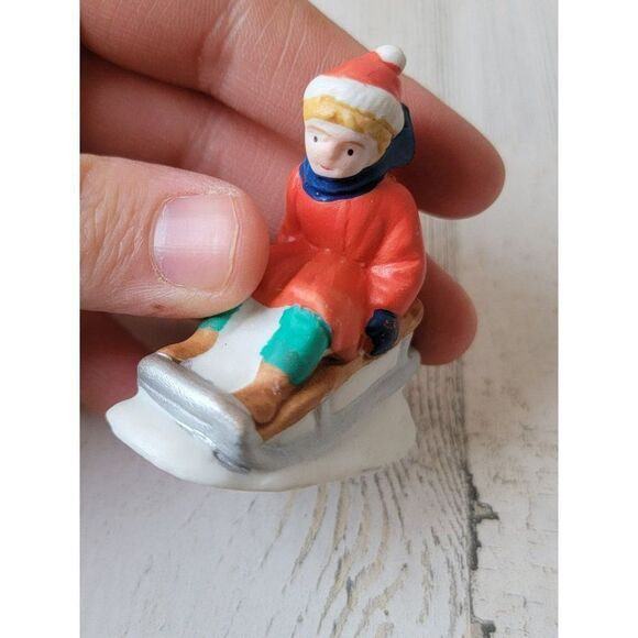 Red girl snow sledding village accessory xmas decor - Picture 3 of 6